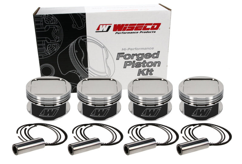 Wiseco Subaru WRX 4v R/Dome 8.4:1 CR 92mm Piston Kit in box with pistons and accessories.