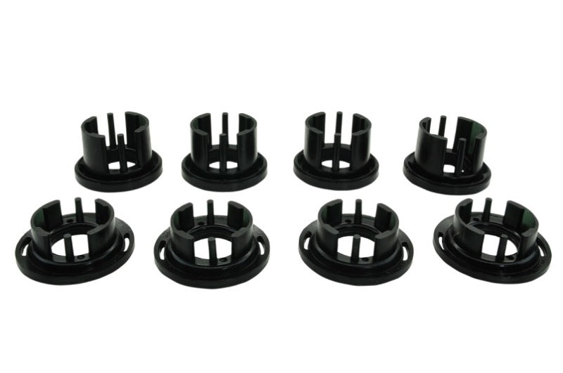 Subaru STi rear positive traction kit components displayed, featuring eight durable bushings designed for enhanced performance.