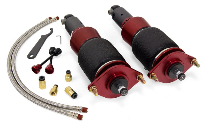 Air Lift Performance Subaru WRX rear suspension kit components with air springs and installation accessories.