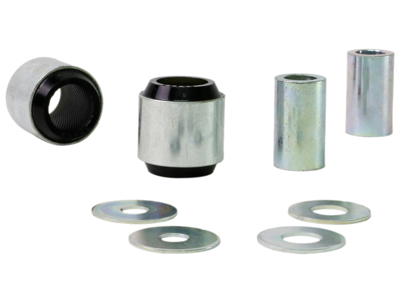 Subaru WRX rear trailing arm bushing kit components including bushings and washers for suspension optimization.