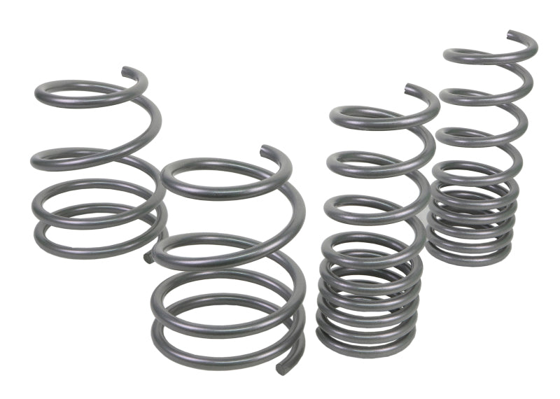 Subaru STI performance lowering springs by Whiteline, designed for improved performance and lowered center of gravity.