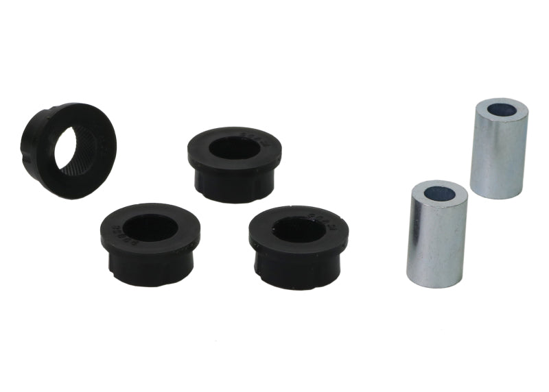 Subaru WRX STI rear toe arm bushing kit components including synthetic bushings and steel sleeves.