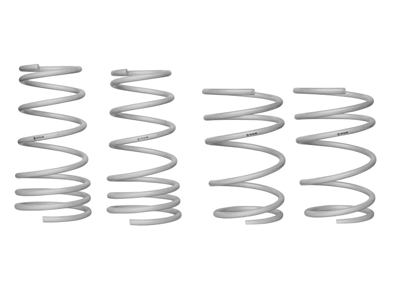 Subaru STi performance lowering springs showcasing linear and progressive rate coil springs for enhanced performance.