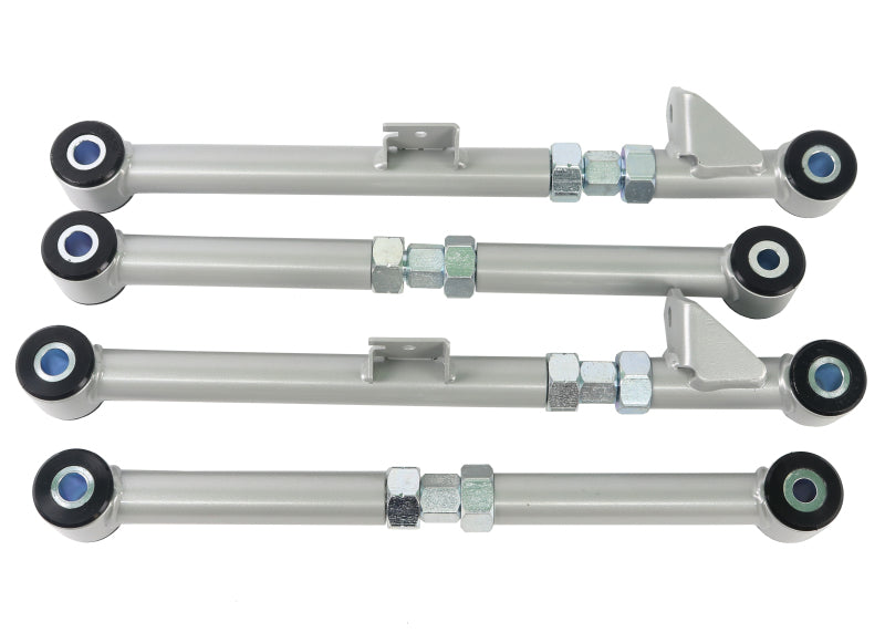 Subaru STi adjustable rear control arms kit with low compliance bushings for camber and toe adjustment.