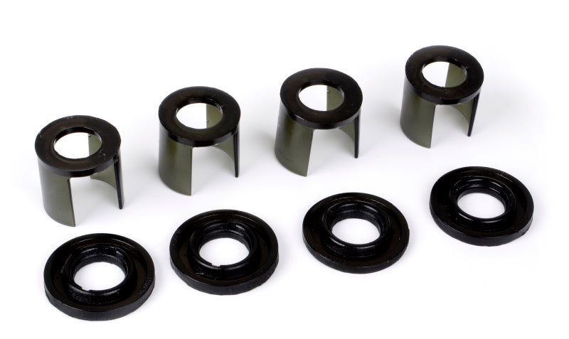 Subaru WRX rear subframe mount insert kit components, including bushings for enhanced stability and alignment.