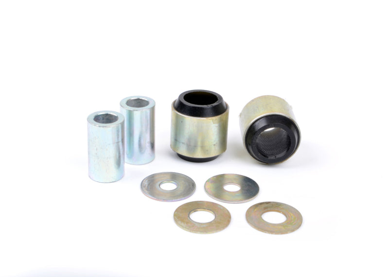 Subaru WRX rear trailing arm bushing kit components including bushings and washers.