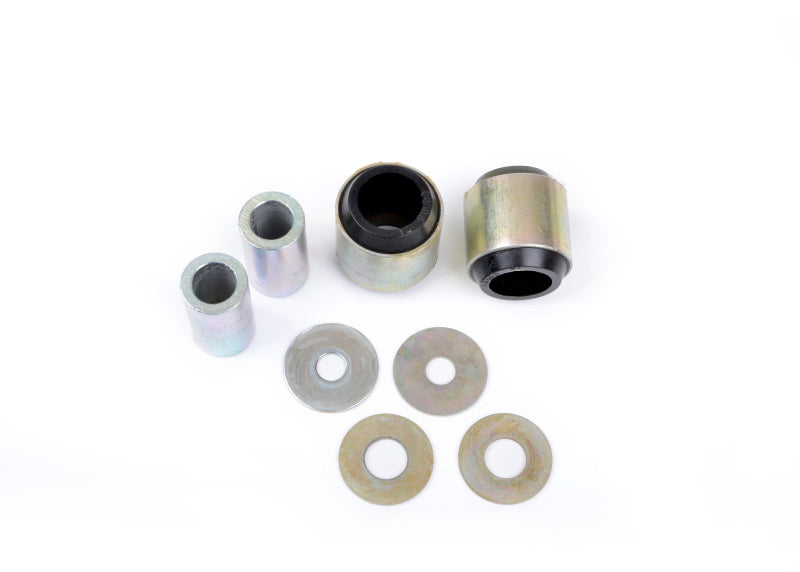 Subaru WRX rear trailing arm bushing kit components including bushings and washers for enhanced suspension performance.