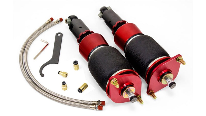 Air Lift Performance Subaru WRX rear suspension kit components including air springs and fittings.